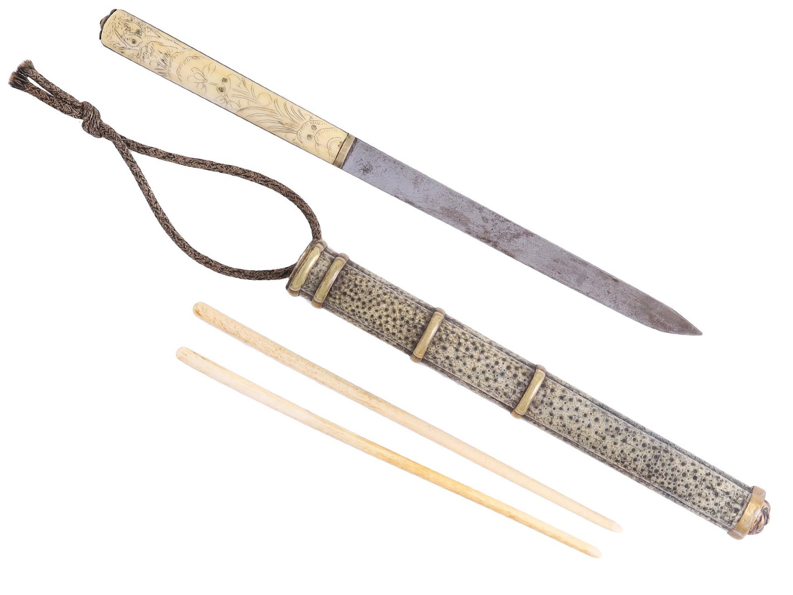 A BRASS-MOUNTED TIBETAN TRAVELING TROUSSE SET, 19TH C.: A fine quality Chinese trousse or travel set mounted in chased brass. It contains a single-edged blade knife with grip scales engraved with floral motifs and two ornate chopsticks, fit in a pierced-br