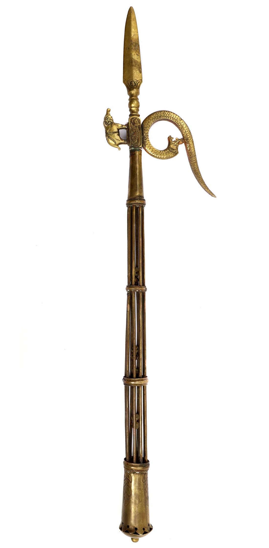 AN OPEN WORK BRASS INDIAN ANKUS, 19TH CENTURY: An Indian brass open work elephant goad or ankus, 19th century. The openwork shaft with small bells ends with an expanding engraved handle. In the upper part, there is a faceted point. The head of the