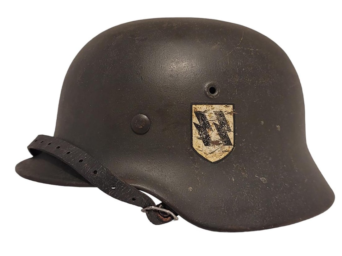 A WW2 GERMAN SS SINGLE DECAL HELMET WITH LINER: M1940 SS "Reverse Runner" quist 6 shell. Comes with the original liner. The shell is stamped 261. The liner is stamped Size 57.