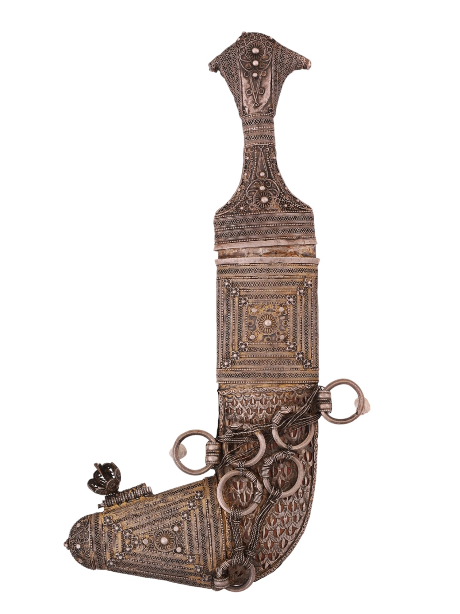 A JEMENY JAMBIYA DAGGER, SAUDI ARABIA SILVER-MOUNTED DAGGER: A fine silver-mounted jambiya dagger. The silver mounts are adorned with beadwork chasing and engraving. The blade is curved with a pronounced central ridge. Ca. 1900. L: 12 1/4 in., (31 cm)