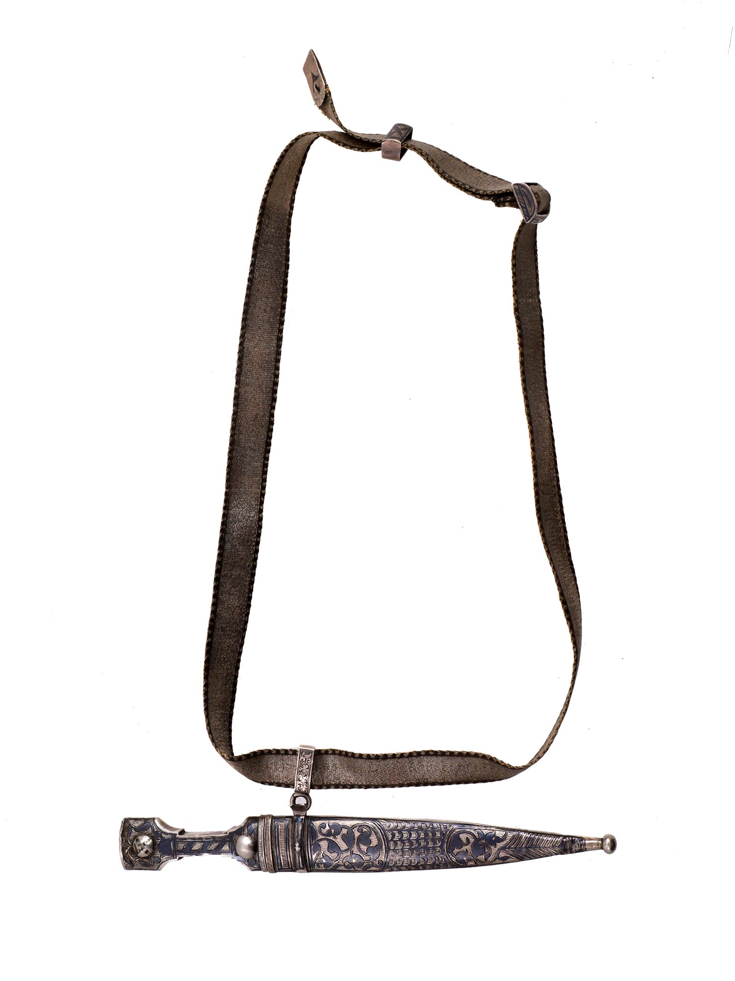 A CAUCASIAN OR RUSSIAN SILVER-MOUNTED DAGGER KINDJAL, 19 C.: An ornately decorated silver mounted Kindjal dagger from the Caucasus of the 19th century, complete with scabbard and strap. L: 6 3/4 in., (17 cm.)