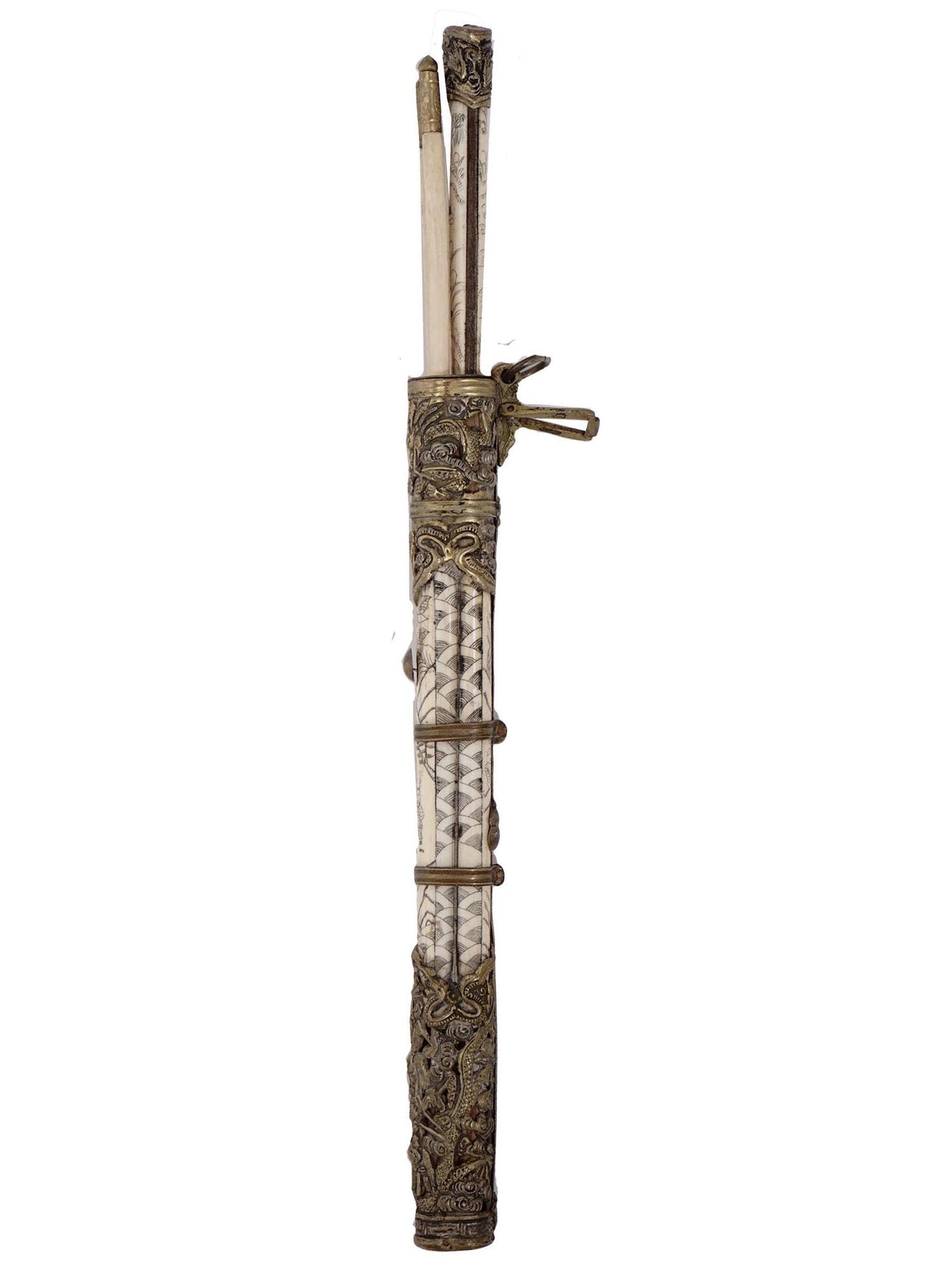 A TIBETAN MONGOLIAN TRAVELING TROUSSE SET, 19TH C.: A fine quality Chinese trousse or travel set mounted in chased brass. It contains a single-edged blade knife with grip scales engraved with floral motifs and two ornate chopsticks, fit in a pierced-br