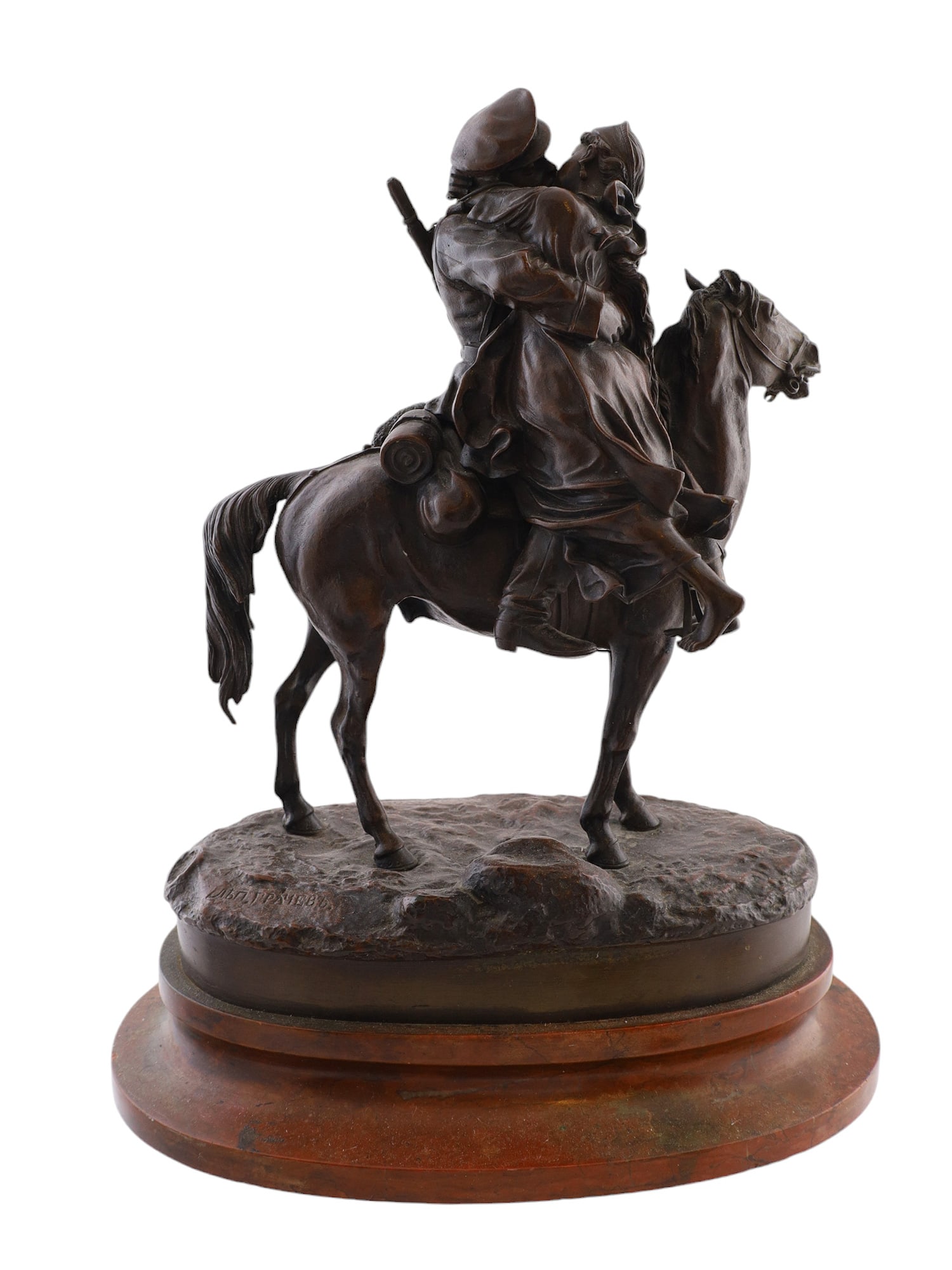 A RUSSIAN BRONZE GROUPING BY GRACHEV FAREWELL KISS, 19TH C.: A Vasily Yakovlevich Grachev (Russian, 1831 - 1905) bronze grouping cast by C. F. Woerfell. Titled "Farewell Kiss" mounted on an oval rouge marble base. Signed in Cyrillic on base. Excellent detail an