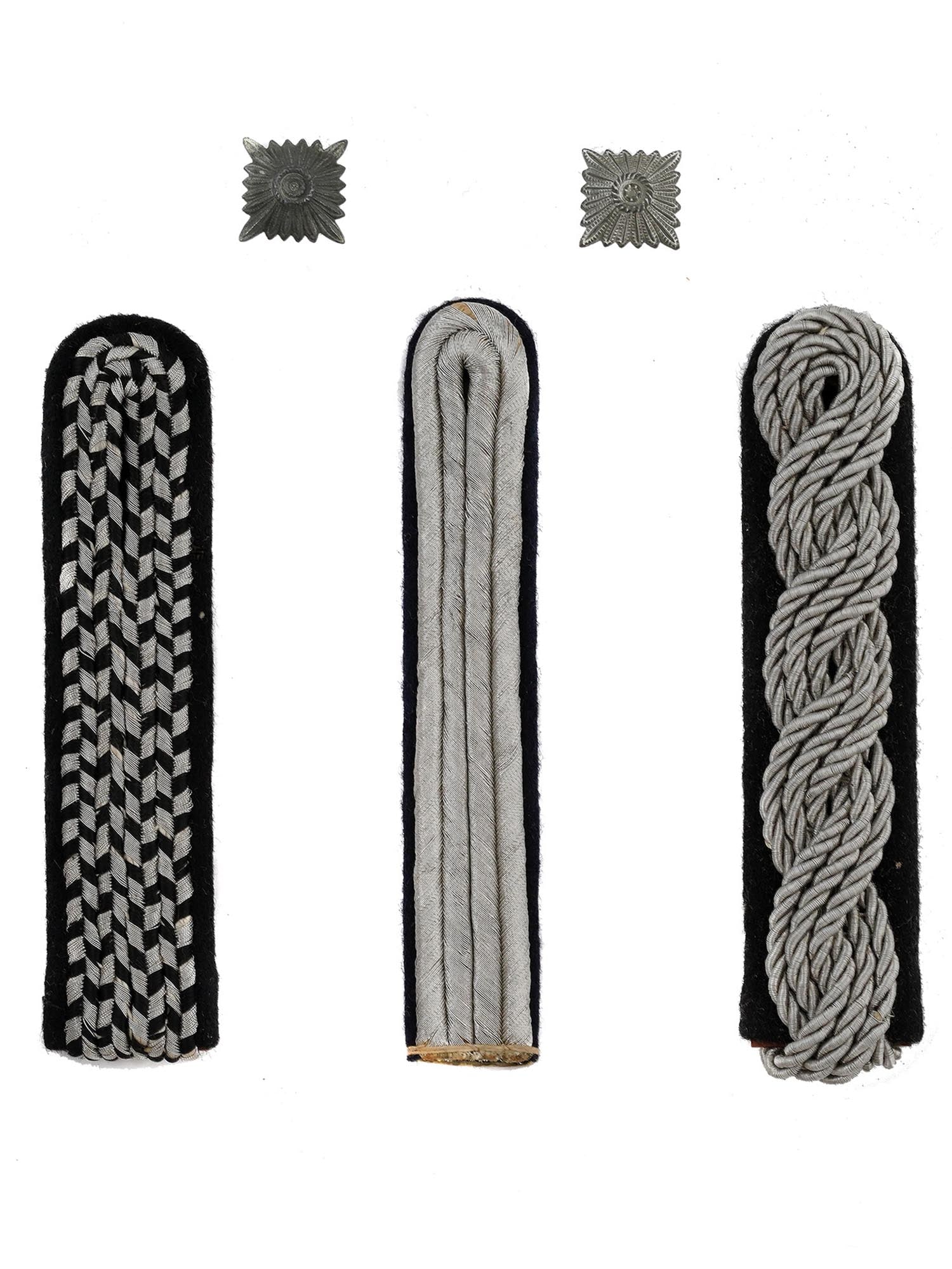 THREE PRE-WWII GERMAN SS SHOULDER BOARDS AND TWO STRAP PIPS: Three Nazi German Allgemeine SS shoulder boards of varying rank and two strip pips, all unissued and in excellent condition. Germany - WWII L: 4 1/4 in., (11 cm.)