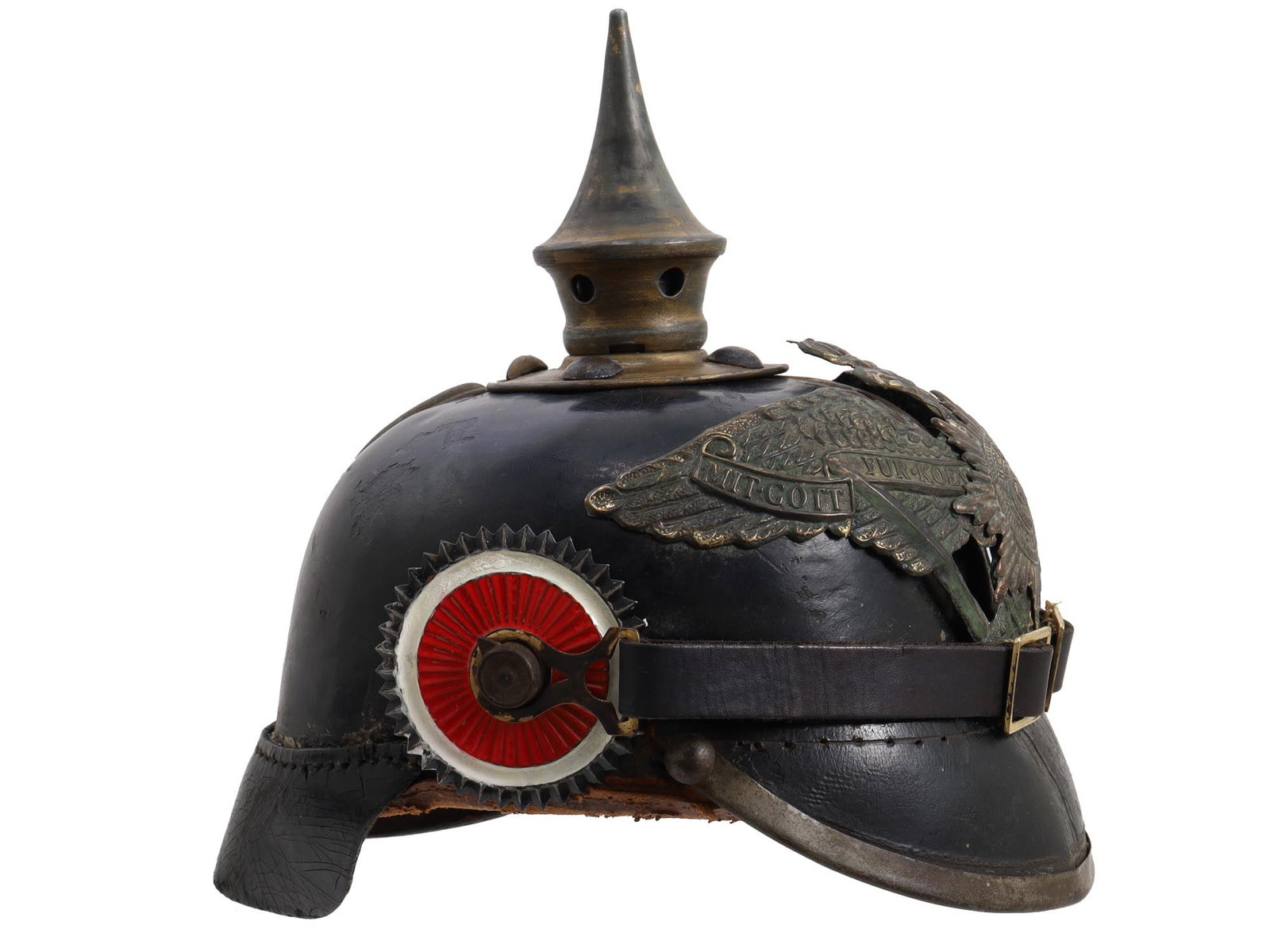 A PRUSSIAN PICKELHAUBE SPIKED HELMET M1895: WWI Prussian Guard Regiment M1895 Pickelhaube Spiked helmet with original liner. L: 9 1/16 in., (23 cm.)
