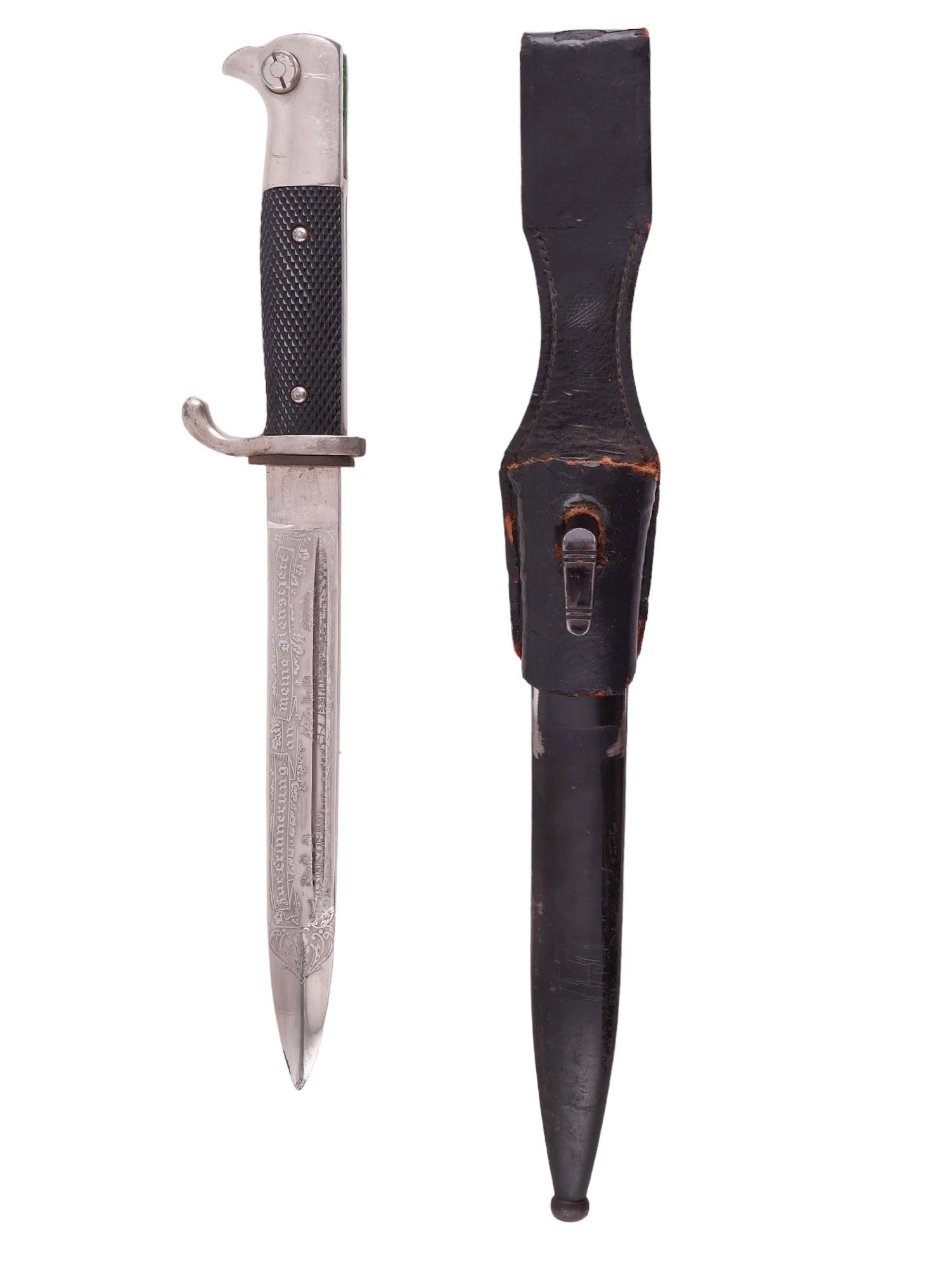 A GERMAN ENGRAVED WWII K98 DRESS BAYONET WITH SHEATH: This Nazi German K98 Dress Bayonet is in fantastic shape. The scabbard and the leather frog both exhibit signs of wear consistent with use and age, but the blade is in near-mint condition. The blade h