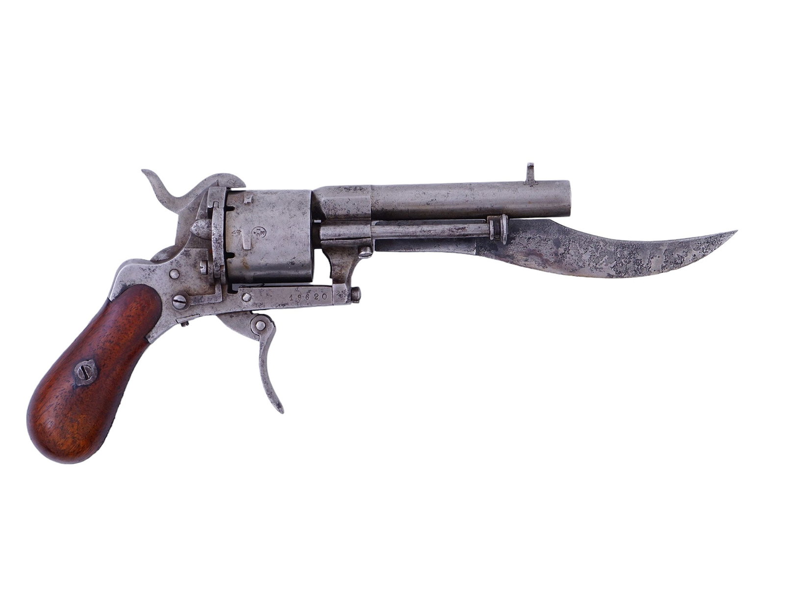 A BELGIAN FOLDING TRIGGER PINFIRE REVOLVER WITH BAYONET, 19TH CENTURY: This 19th-century pinfire revolver was made in Liège, Belgium, and is affixed with a very unusual, curved bayonet underneath the barrel. The cylinder holds six rounds in total and the bore is 7mm in 