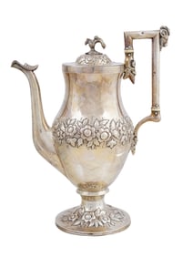 A KIRK COIN SILVER COFFEE OR TEA POT WITH REPOUSSE PATTERN