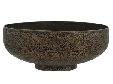 A QAJAR IRANIAN ENGRAVED BRASS FIGURAL BOWL