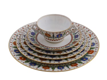 A KORNILOV PORCELAIN SET OF FIVE PLATES, SAUCERS, AND CUP
