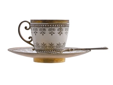 A SILVER AND ENAMEL COFFEE CUP, SAUCER, AND SPOON