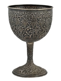 A SILVER REPOUSSE 1ST PRIZE TROPHY GOBLET, INDIA, 1895