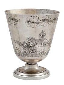 A EUROPEAN COLONIAL SILVER CUP WITH RELIEF DECORATION, CA. 1860