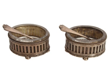 A SET OF TWO RUSSIAN OVAL K. FABERGE SILVER SALT CELLARS