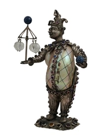 A SILVER-MOUNTED SHELL COURT JESTER FIGURE, 19TH CENTURY