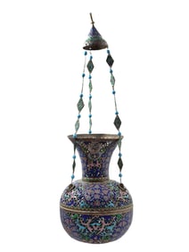 AN ISLAMIC ENAMELED AND PIERCED BRASS HANGING LAMP