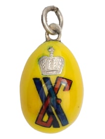 A MINIATURE RUSSIAN SILVER AND ENAMEL EASTER EGG, 19TH C.