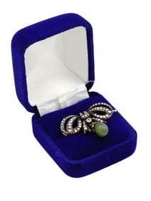 A FABERGE BROOCH IN SILVER AND GOLD, SET WITH DIAMONDS AND A GREEN STONE, IMPERIAL RUSSIA