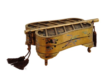 A JAPANESE MEIJI ERA LACQUERED FAN-FORM BOX