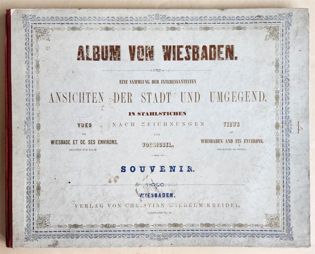 1850S ALBUM VON WIESBADEN ANTIQUE ILLUSTRATED W/ STEEL ENGRAVINGS: Voddiggel. Album of Wiesbaden. Wiesbaden, Kreidel n.d. (around 1850) With 9 (of 11) steel engravings protected by tissue guards Size 9 1/4 by 11 3/4" Hard bound with cloth spine Foxing Text in German