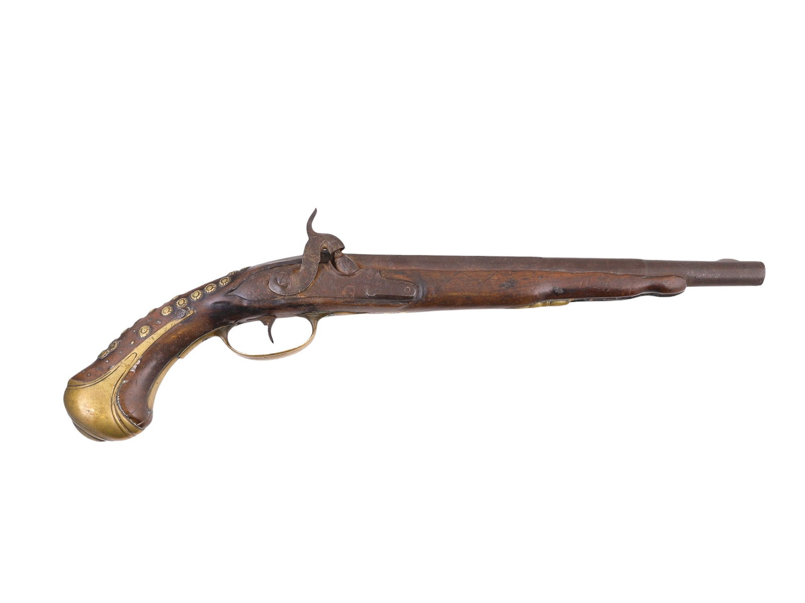 AN EASTERN BRASS-MOUNTED PERCUSSION PISTOL, 19TH CEN.: A brass-mounted percussion pistol made for the Eastern market, ca. 1860. Round smoothbore, 17 mm diameter. The ramrod is missing. Dimensions: L: 18 1/2 in., (47 cm.) Please make all inquiries before b