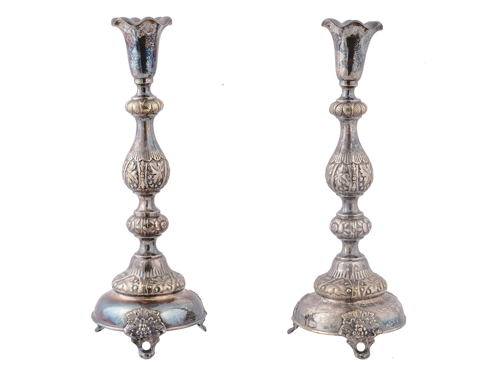 A PAIR OF FRAGET N PLAQUE CANDLESTICKS: A pair of Fraget N Plaque candlesticks, typically used for the celebration of the Sabbath. Each is marked on the underside with the maker's stamp, Russian coat of Arms, and the number '4222' Dimension