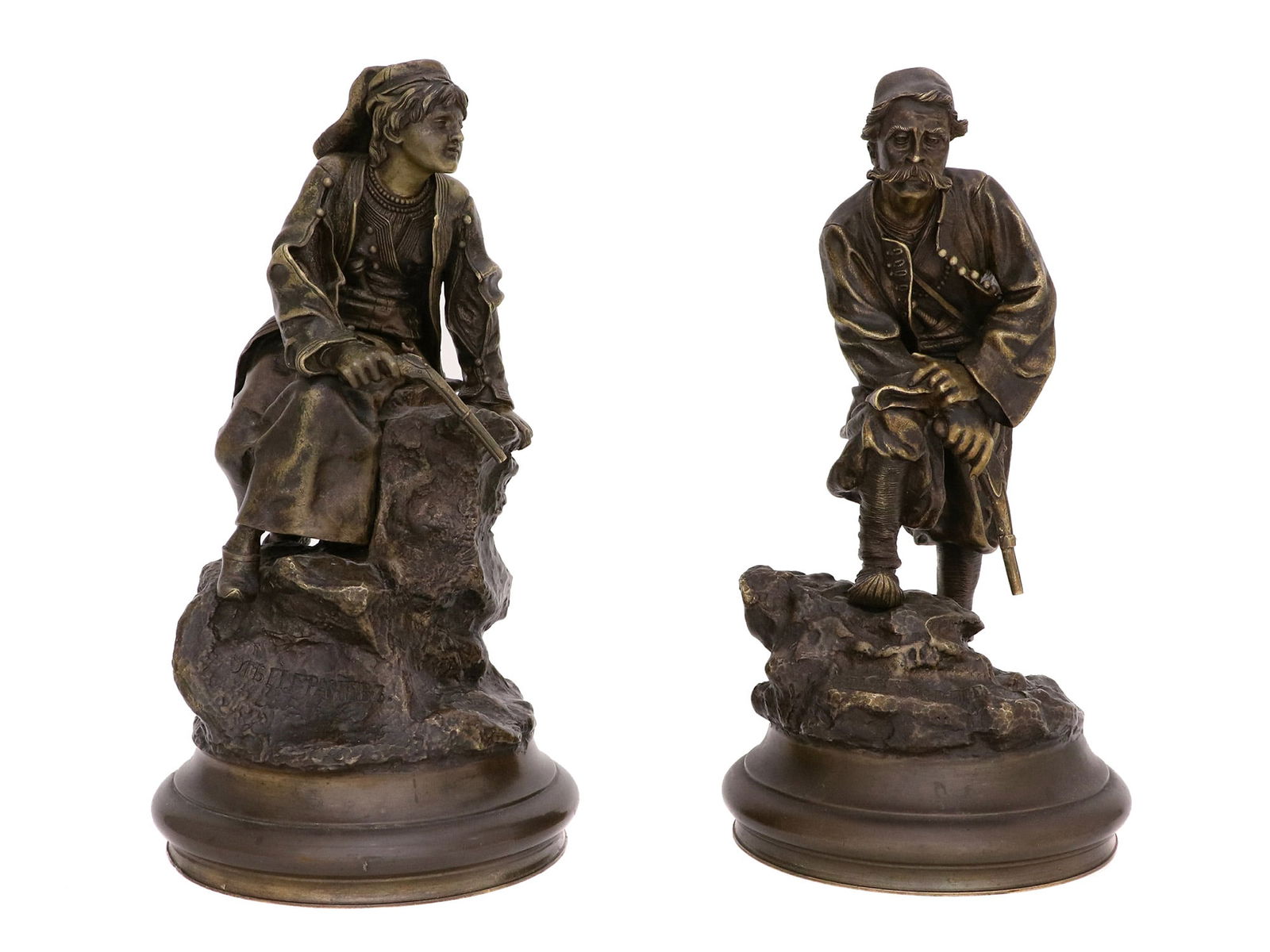 PAIR OF RUSSIAN BRONZE FIGURES, GRACHEV, 19TH C.: A PAIR OF PATINATED RUSSIAN BRONZE FIGURES. "Sentries" Cast by C.F. Woerffel after a model by Vasiliy Grachev (1831-1905). Both on naturalistic round bases, realistically cast as a male and a female s