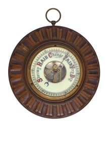 AN ANTIQUE ANEROID BAROMETER IN A WOOD FRAME, CA. 1900