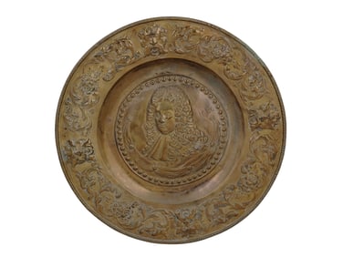 A LARGE BRASS FRENCH REPOUSSE CHARGER WITH LOUIS XIV