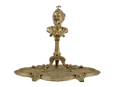 A GILT BRONZE OIL OIL LIGHTER FEATURING A FAUN, FRANCE, 19 C.
