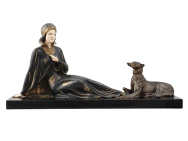 AN ART DECO SCULPTURE OF A YOUNG WOMAN WITH A GREYHOUND, CA. 1930
