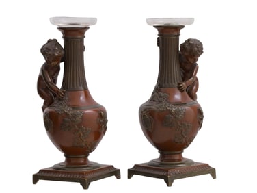 A PAIR OF BRONZE ROMANESQUE VASES WITH PLAYFUL PUTTI, 19TH CENTURY