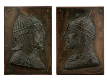 A PAIR OF FRENCH BRONZE WOOD MOUNTED PLAQUES