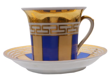 A RUSSIAN GILT-PORCELAIN CUP AND SAUCER BY POPOV, CA. 1860