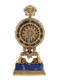 AN ORMOLU BRONZE CLOCK BY MAJESTIC WATCH CO. ON A LAPIS LAZULI BASE, 20TH C.