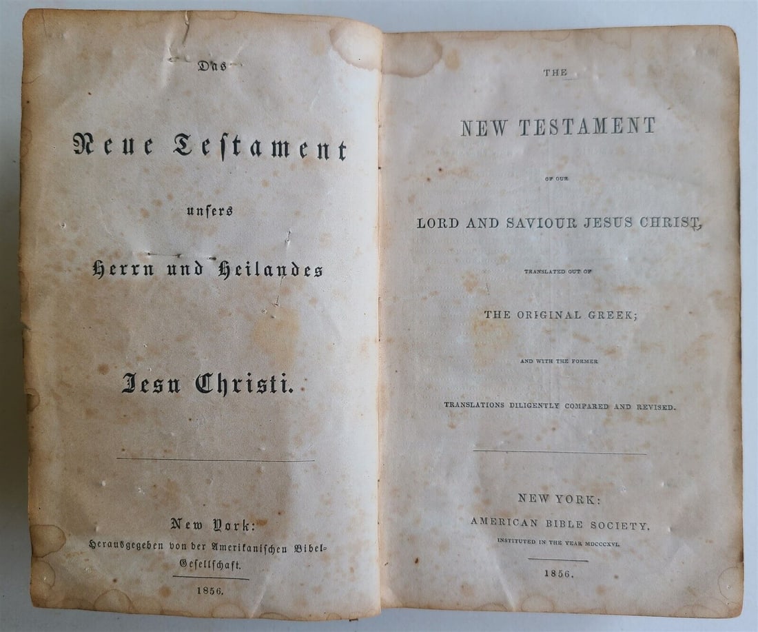 1856 BIBLE IN ENGLISH & GERMAN ANTIQUE NEW TESTAMENT NEW YORK AMERICANA: THE NEW TESTAMENT New York; 1856 Size: 4.5 by 7" Original leather binding , worn Some foxing, spine damaged, front cover is partially detached (holds on cords), endpapers and title page with some pin