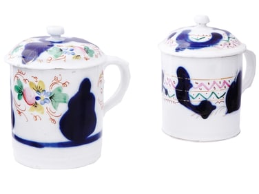 A PAIR OF RUSSIAN LIDDED TEA CUPS BY KUZNETSOV PORCELAIN, 19TH CEN.