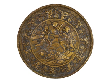 A HAMMERED-BRASS INDIAN DHAL SHIELD WITH MONSTERS, 19 C.
