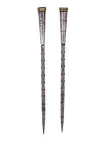 A PAIR OF INDO-PERSIAN CHASED STEEL SPEAR BUTTS, 18TH OR 19TH CENTURY