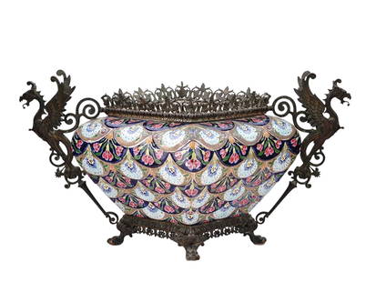 A LARGE BRONZE AND ENAMEL PLANTER BY FISCHER, HUNGARY, 19TH CEN.: A large and ornate bronze and enamel planter produced by the firm of IgnƔce Fischer of Budapest, Hungary in the last half of the 19th century. The ceramic body is of a square form which tapers from t