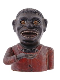 A DIE-CAST IRON BANK, 1900