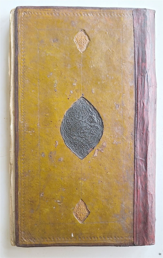 19TH CENTURY ARABIC MANUSCRIPT ON FIVE PILLARS OF ISLAM ANTIQUE HAND WRITTEN: ARABIC MANUSCRIPT on FIVE PILLARS OF ISLAM Text in FARSI 19th century, not dated Purchased in Uzbekistan Original leather binding with embossed medallions Size 6 1/4 by 10 1/4" Nice calligraphy about