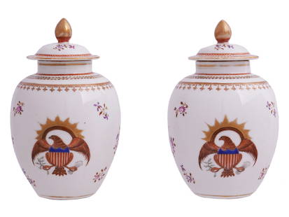 A PAIR OF CHINESE EXPORT LIDDED PORCELAIN VASES FOR THE U.S. MARKET, CA. 1900: A pair of Chinese export hand-painted lidded porcelain vases for the United States market. Wiht a central decoration of the emblem of the United States of America, representing a bald eagle with arrow