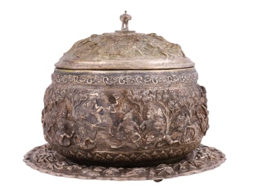 A BURMESE SILVER REPOUSSÉ LIDDED BOWL WITH ELEPHANT FINIAL, (MYANMAR), LATE 19TH CENTURY