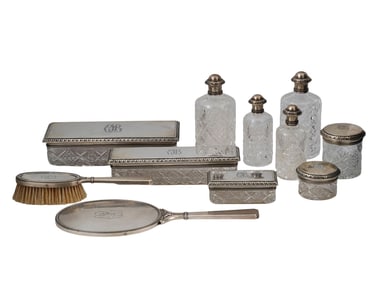 A LOT OF ELEVEN CUT CRYSTAL AND SILVER-MOUNTED TOILET PIECES BY K. FABERGÉ, MOSCOW, EARLY 20TH