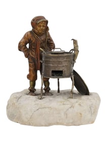 A VIENNA MINIATURE BRONZE OF A CHESTNUT SELLER, CA. 1890