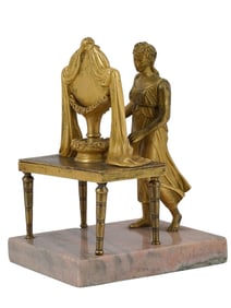 FRENCH EMPIRE GILT BRONZE FIGURAL SCULPTURE OF A "MAIDEN AT THE MIRROR", C. 1810