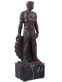A BRONZE FIGURE OF A WORKER BY ERNST SEGER, GERMAN, CA. 1930