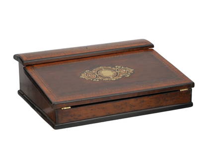 A VICTORIAN-ERA ENGLISH WRITING SLOPE, ALSO KNOWN AS A WRITING BOX: A fine example of a gentleman's or lady’s portable writing desk, this English writing slope is crafted from richly figured rosewood veneer and accented with ornate brass inlay, exemplifying the deco