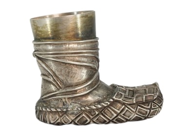 A SILVER VODKA CUP SHAPED AS A BAST SHOE (LAPTI)